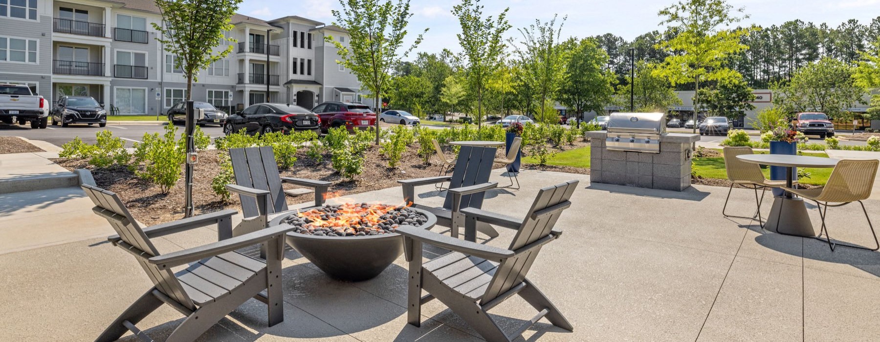 a group of chairs and a fire pit