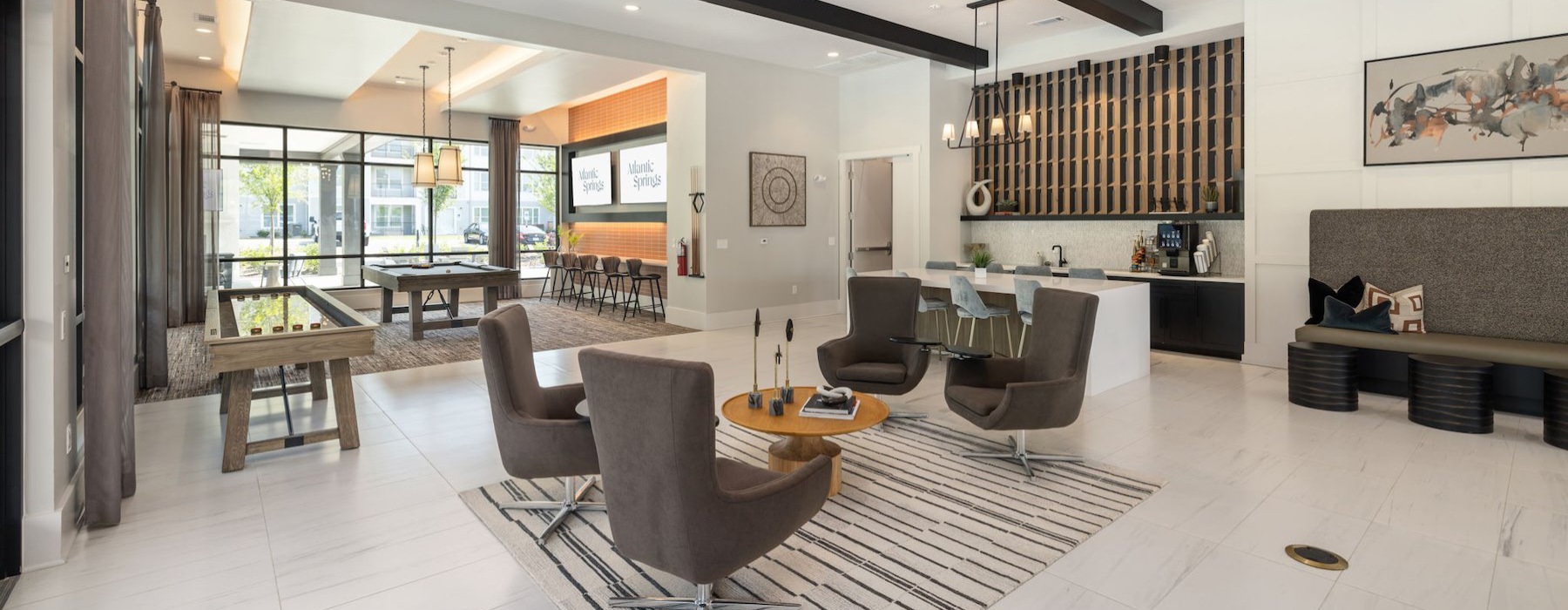 a clubroom with chairs and tables